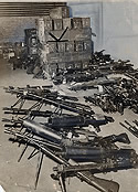 Machine Guns Seized in Arsenal Raid by T-Men