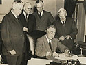 Roosevelt Signs the Draft Bill